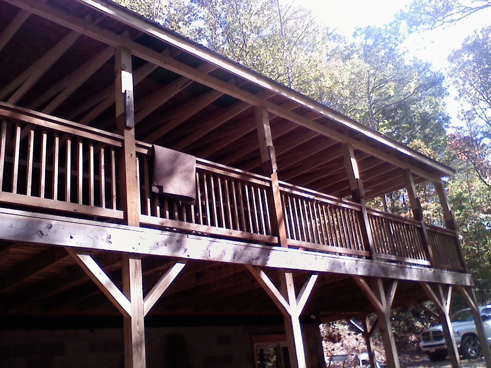 Timber framing under a new elevated porch and deck — Roof Leak Repair in Midvale by Roofing Brothers